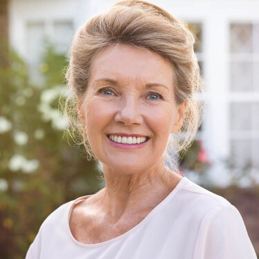 Woman Smiling After Dental Visit